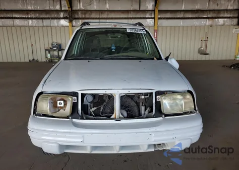 2003 Chevrolet Tracker Lt z USA, uszkodzony, nr VIN 2CNBE634736914670